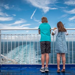 Children outside on a Ferry to France