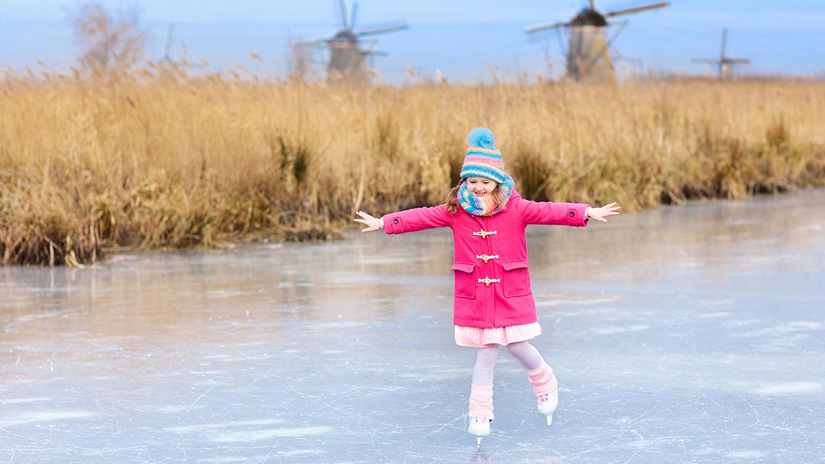 Child ice skating in Holland